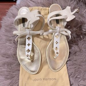 Off white sandals. Louis Vuitton with the logo